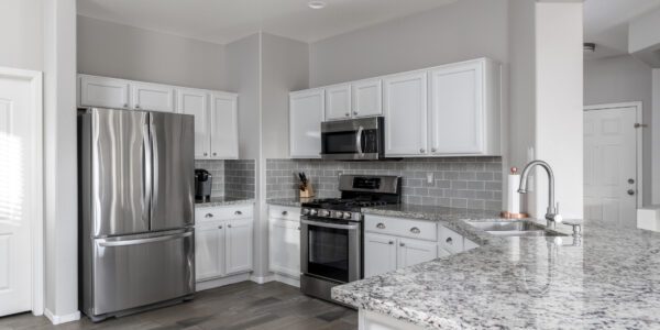 we love our new kitchen, kitchen reno granite ctop cab sink tile flooring living room