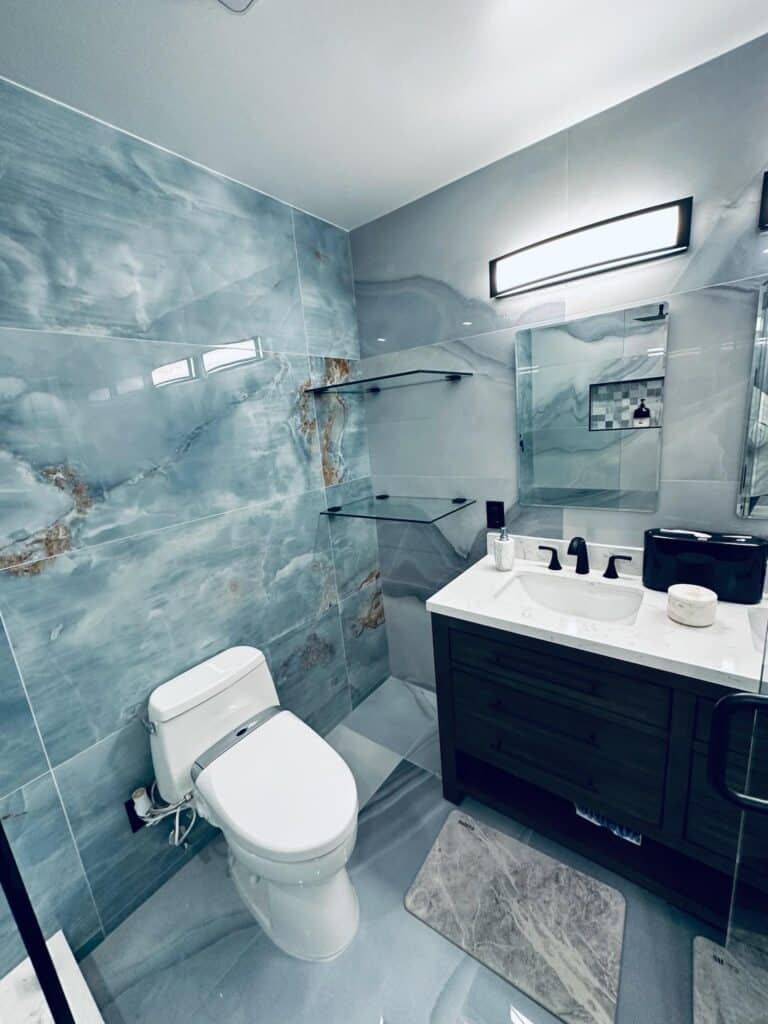 Upscale Bathroom Renovation - Madrid's Contracting