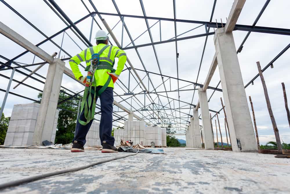 contractor wearing safety harness